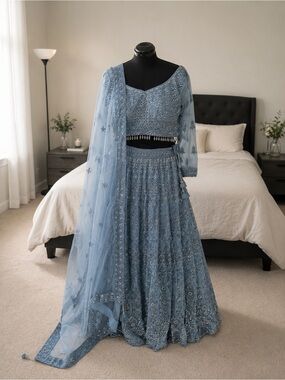 Elegant Powder Blue Bridal Lehenga with Embellished Blouse and Dupatta